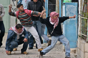 Arabs throwing stones